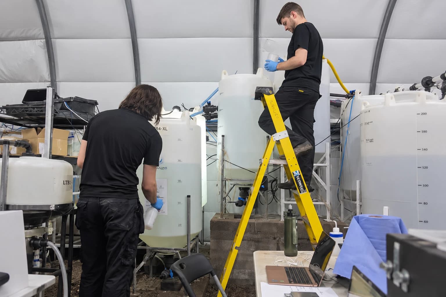 The team working on conical culture tanks at the Eden Campus